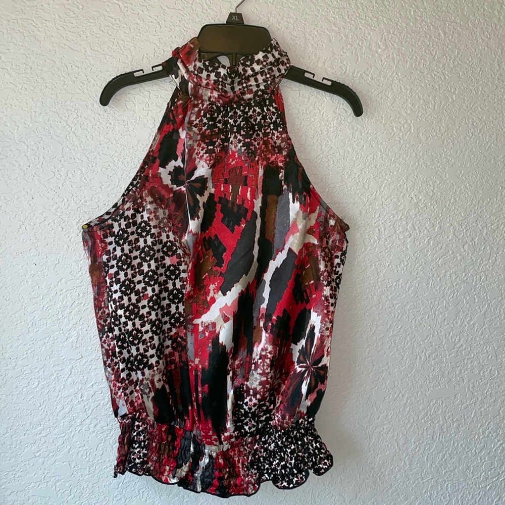 Super sexy halter style top from Sele. Size S. Like new! Excellent condition!
